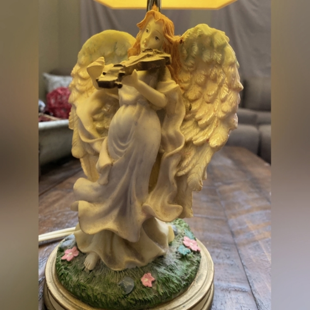 Antique angel lamp